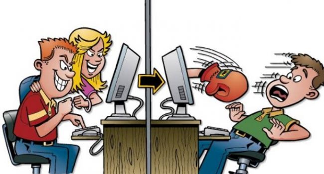 Vignetta con sulla sinistra un ragazzo e una ragazza che digitano sulla tastiera del computer con sguardo cattivo, sulla destra si vede un ragazzo davanti al computer che si ritrae perché dallo schermo del computer esce un mano con guantone da boxe intenta a sferrare un pugno.